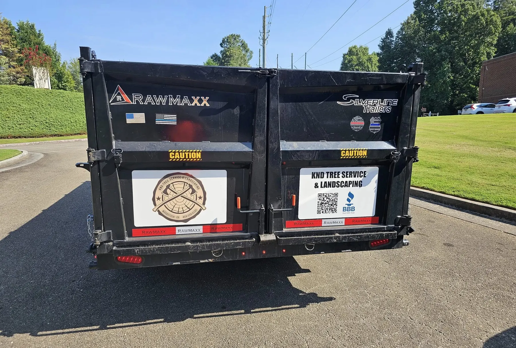KND dump trailer loaded and ready for debris hauling