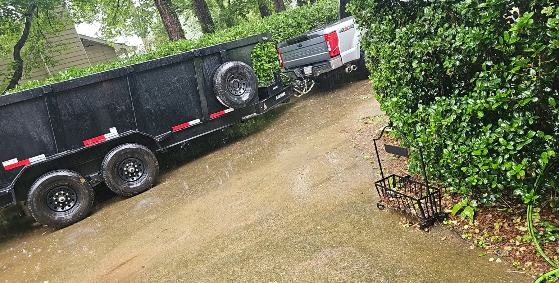 Dump trailer parked at a residential job